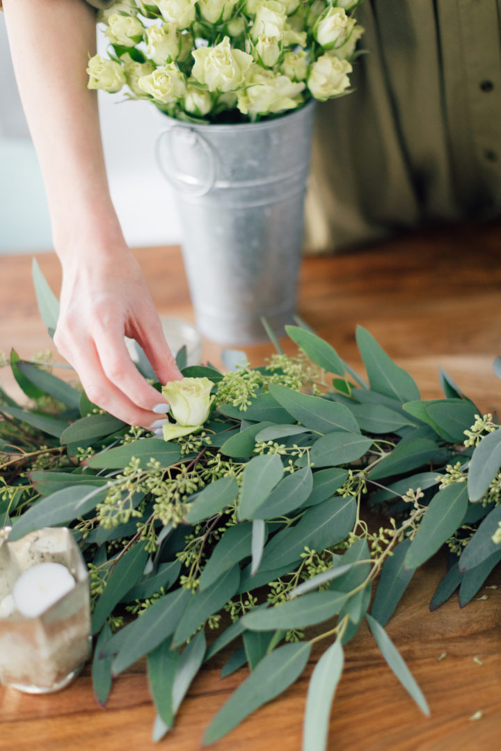 Eva Amurri Martino crafts a DIY eucalyptus garland for the holidays. 