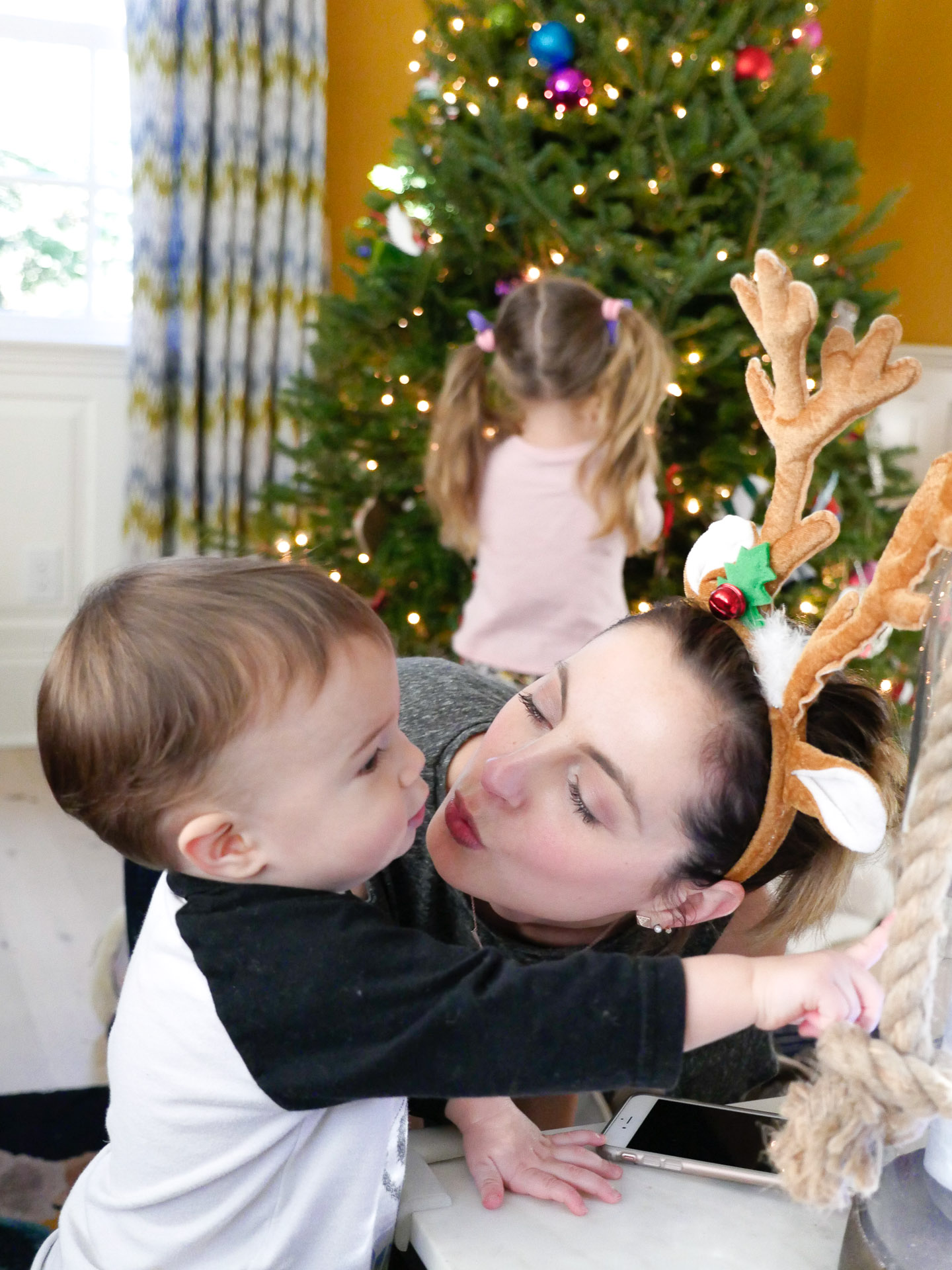 Eva Amurri Martino kisses son Major while they decorate the family Christmas tree Christmas tradition for kids