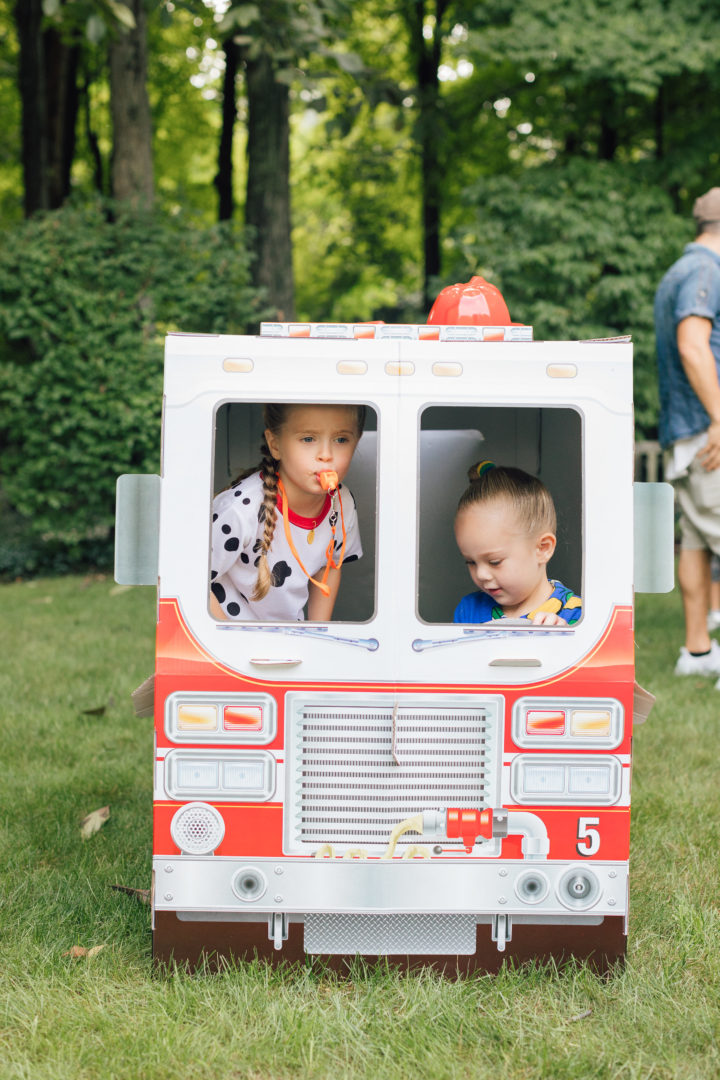 Marlowe Martino and a friends at her 4th birthday party inside of Melissa & Doug fire truck
