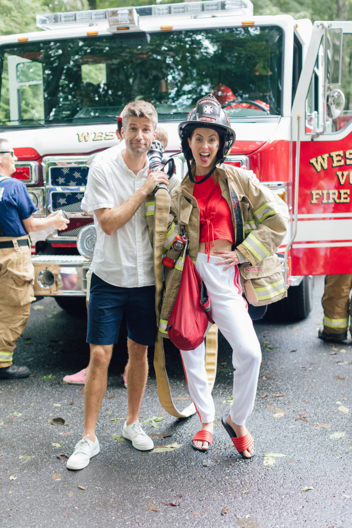 Eva Amurri Martino and husband Kyle post in fireman gear at their daughter's 4th birthday party