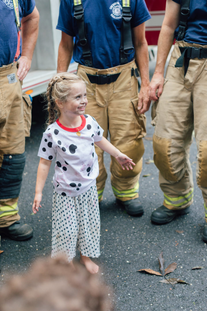 Eva Amurri Martino's daughter Marlowe talks to firemen at her 4th birthday party