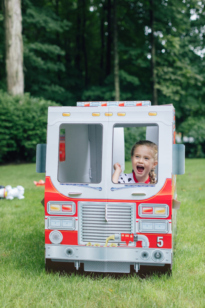 Marlowe Martino at her 4th birthday party inside of Melissa & Doug fire truck