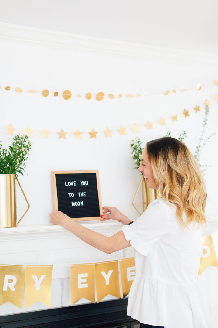 Eva Amurri Martino displays a 'Love You To The Moon' sign at her Celestial Baby Sprinkling Party