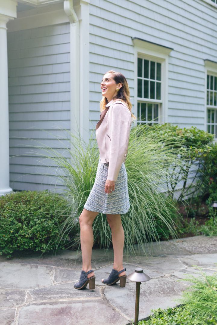 Eva Amurri Martino wears a blush pink suede motorcycle jacket and flowy tweed Loft skirt for a warm fall