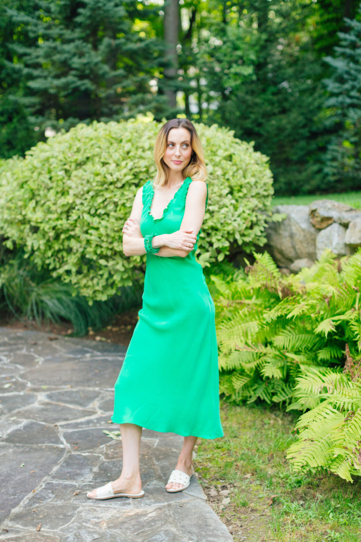 Eva Amurri Martino wears a bright green dress outside her home in Connecticut.