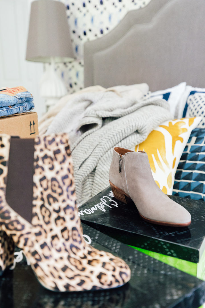 Eva Amurri Martino unpacks a pair of leopard print boots from her Amazon Prime Wardrobe