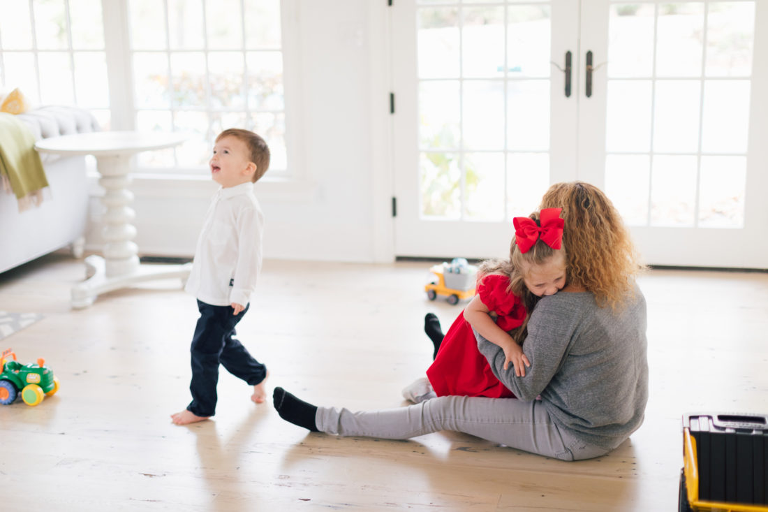 Eva Amurri Martino's two small children play with their nanny in the family room of their connecticut home