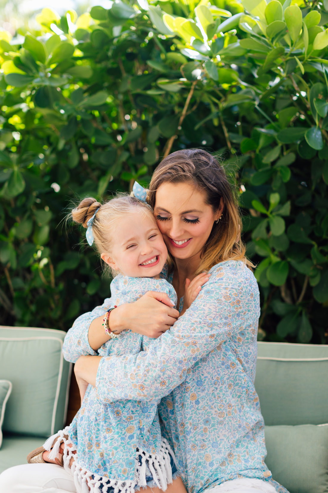Eva Amurri Martino and Marlowe Martino wear matching masala baby tunics in a blue floral print from their limited capsule collection for the brand. 