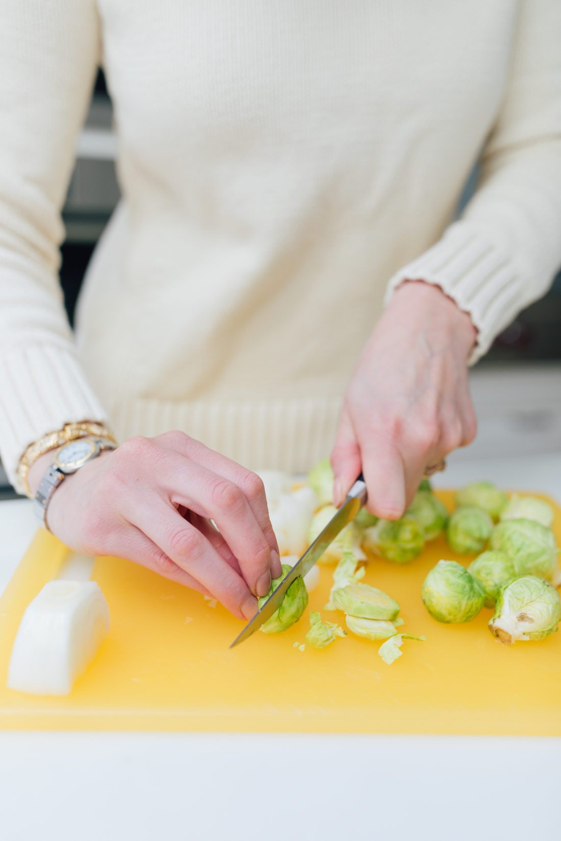 Eva Amurri Martino preps her Brussel Sprouts side dish in her kitchen in Connecticut