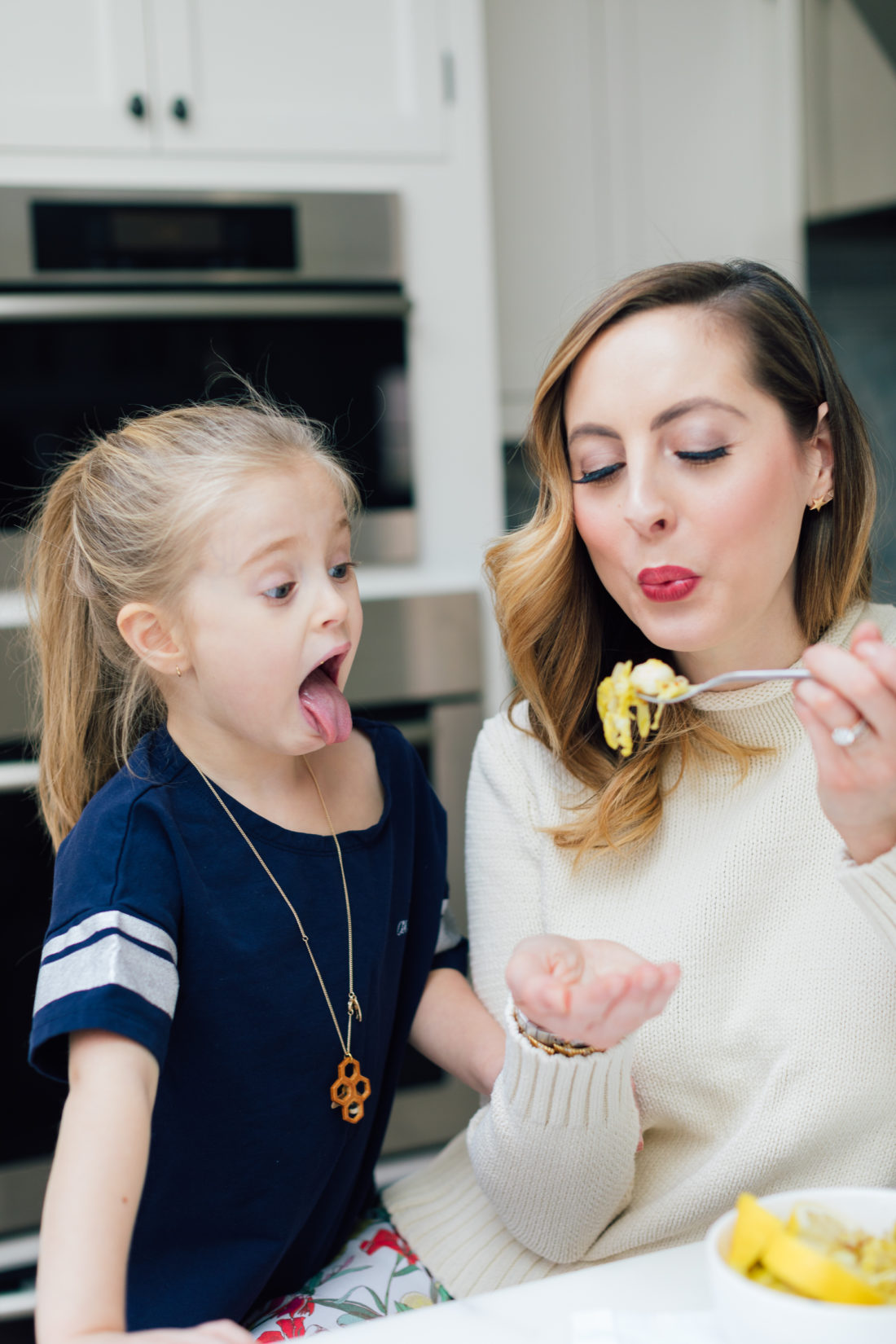 Eva Amurri Martino spoon feeds daughter Marlowe some of her brussels sprouts
