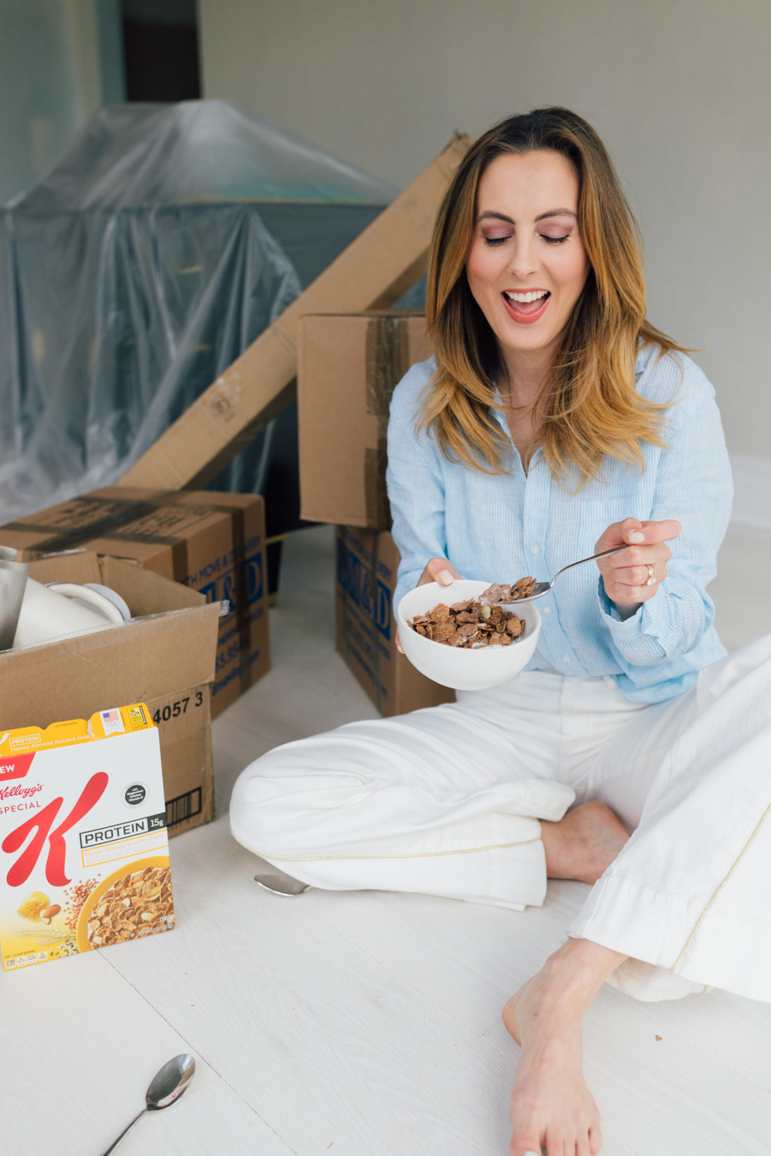Eva Amurri Martino of Happily Eva After sits on the floor of her newly renovated historic home in Connecticut, enjoying a bowl of Special K