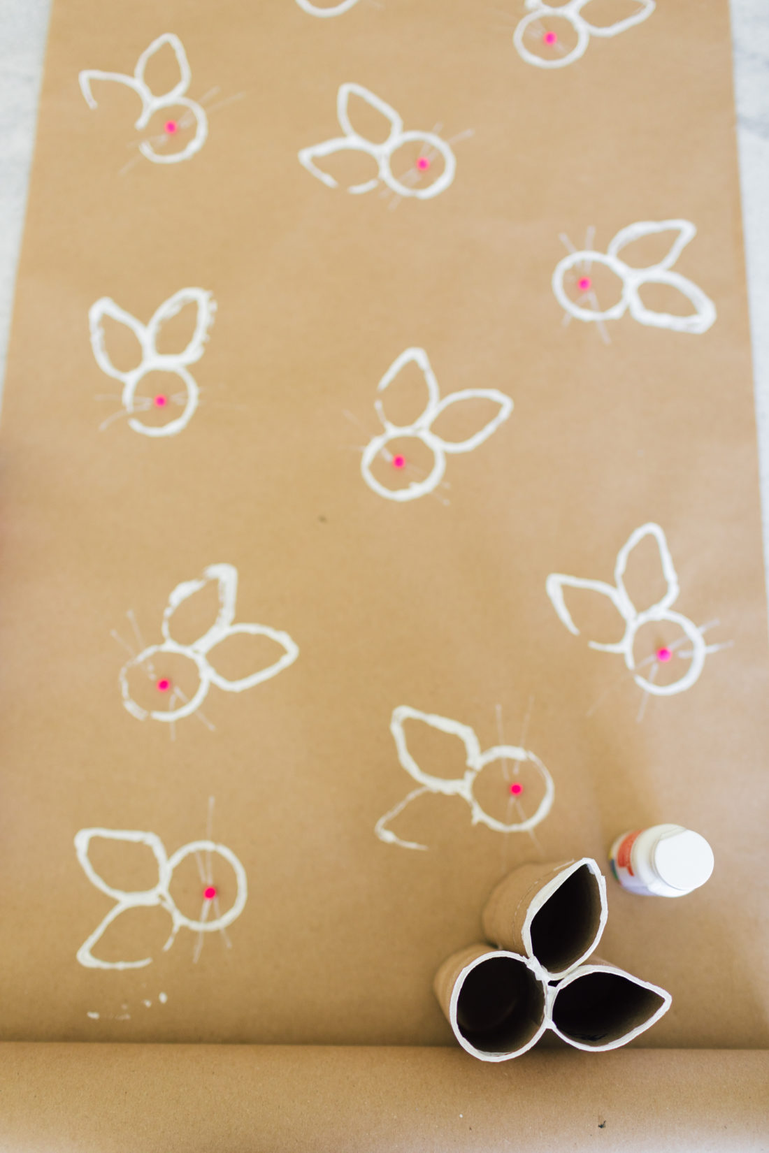 Eva Amurri Martino stamps bunnies onto wrapping paper for Easter
