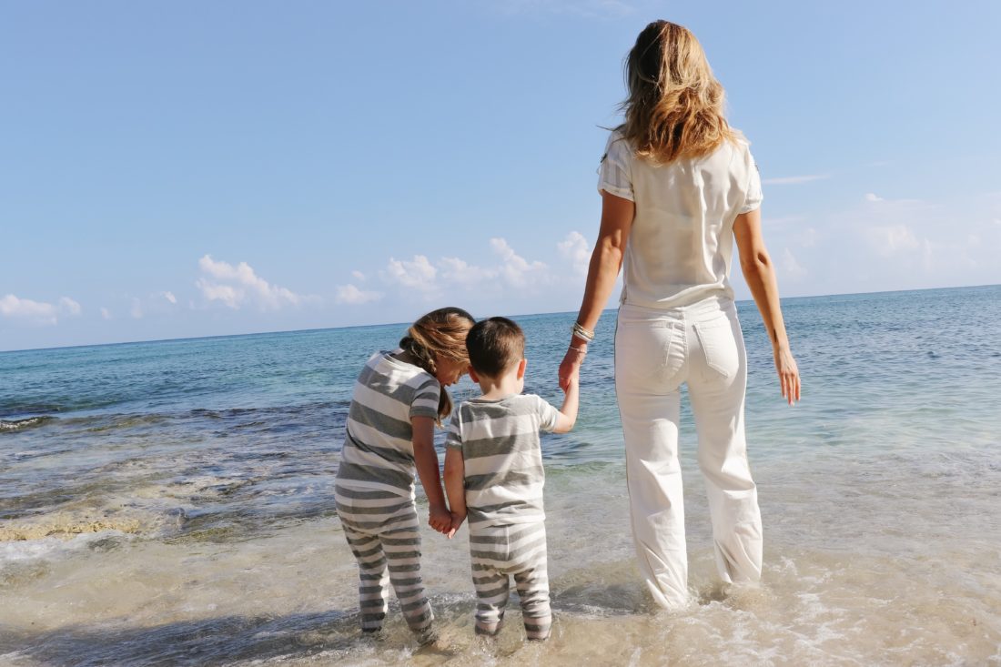 Eva Amurri Martino stands on the beach in Connecticut with her kids Marlowe and Major