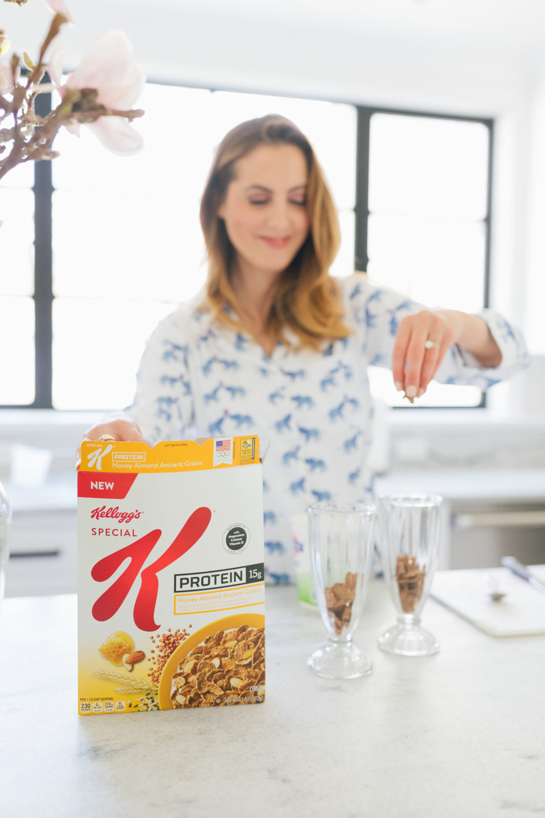 Eva Amurri Martino of Happily Eva After sprinkles Special K Ancient Grains in a parfait