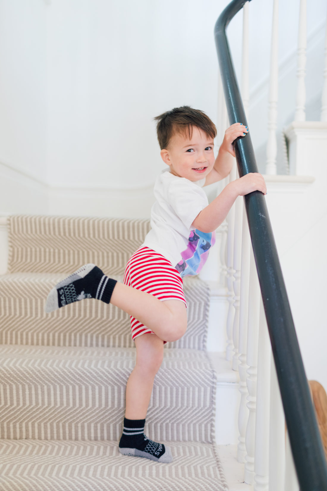 Major Martino stands on the stairs wearing his new big boy underwear as he starts the potty training process