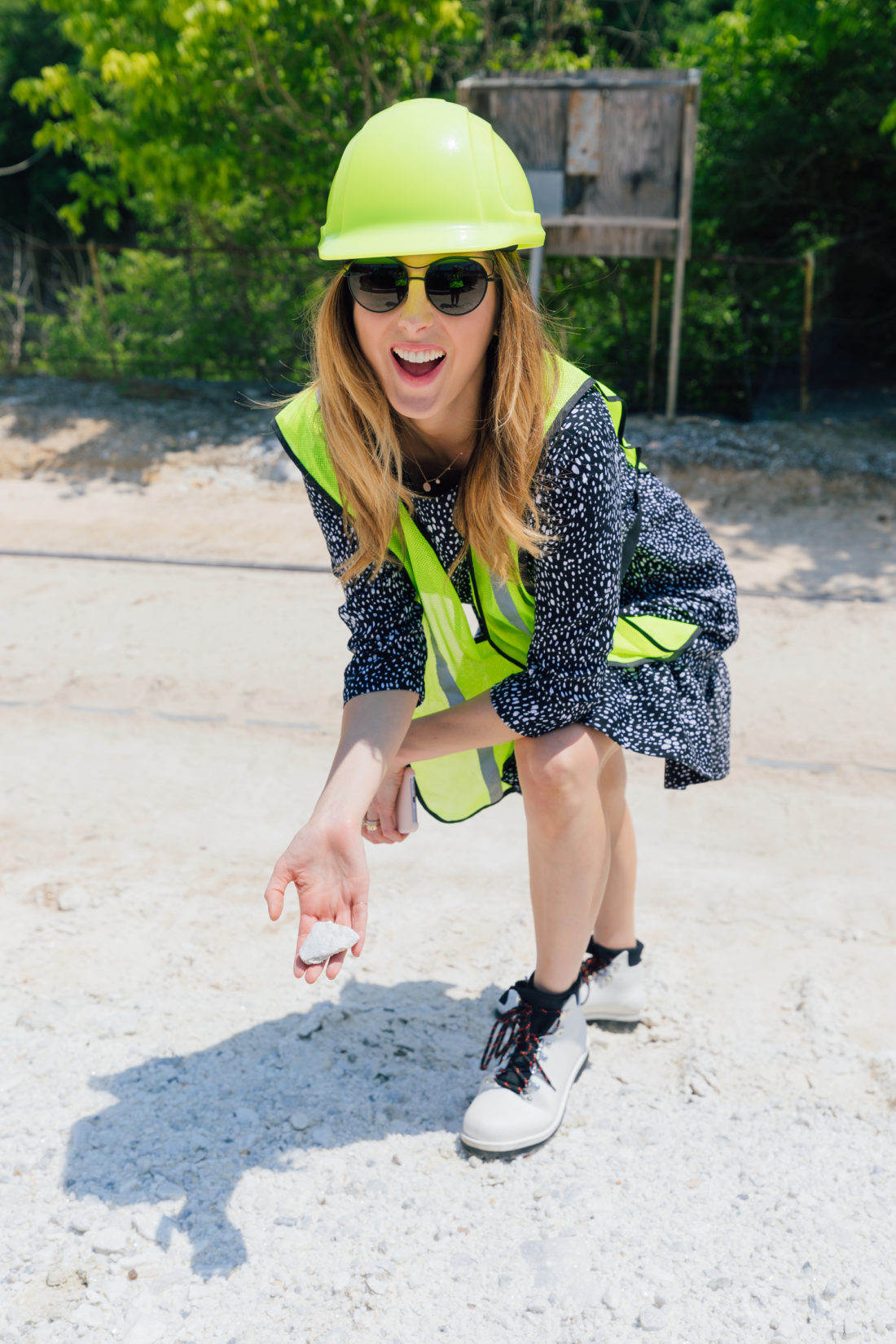 Eva Amurri Martino holds a small slab of marble at the Polycor quarry in Georgia