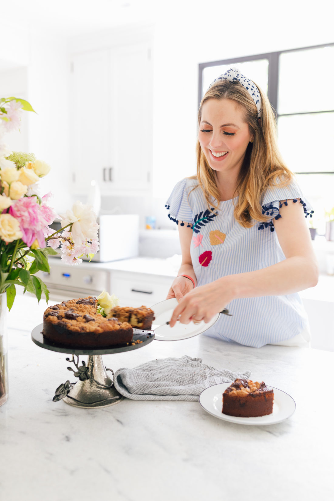 Eva Amurri Martino cuts into her delicious coffee cake at her home in Connecticut