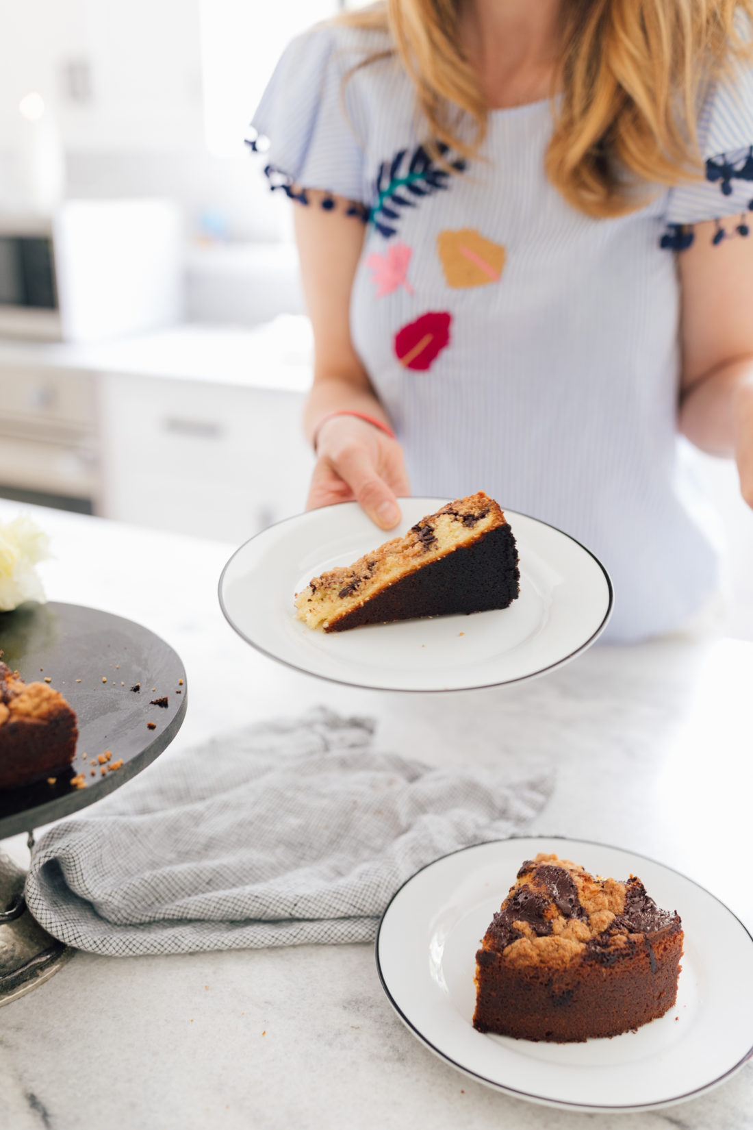 Eva Amurri Martino holds a slice of coffee cake at her home in Connecticut