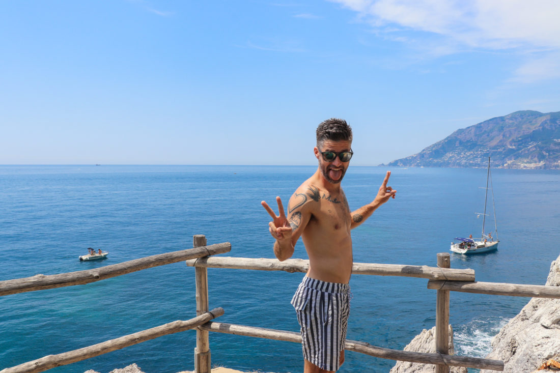 Kyle Martino posing in the Amalfi Coast