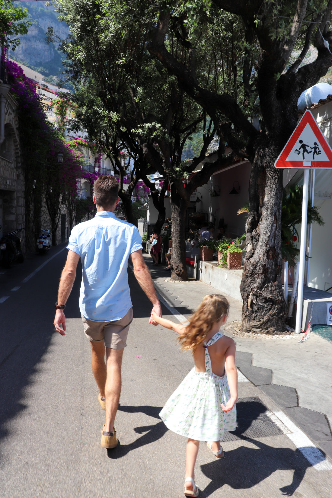 Kyle Martino holds daughter Marlowe's hand on the Amalfi Coast