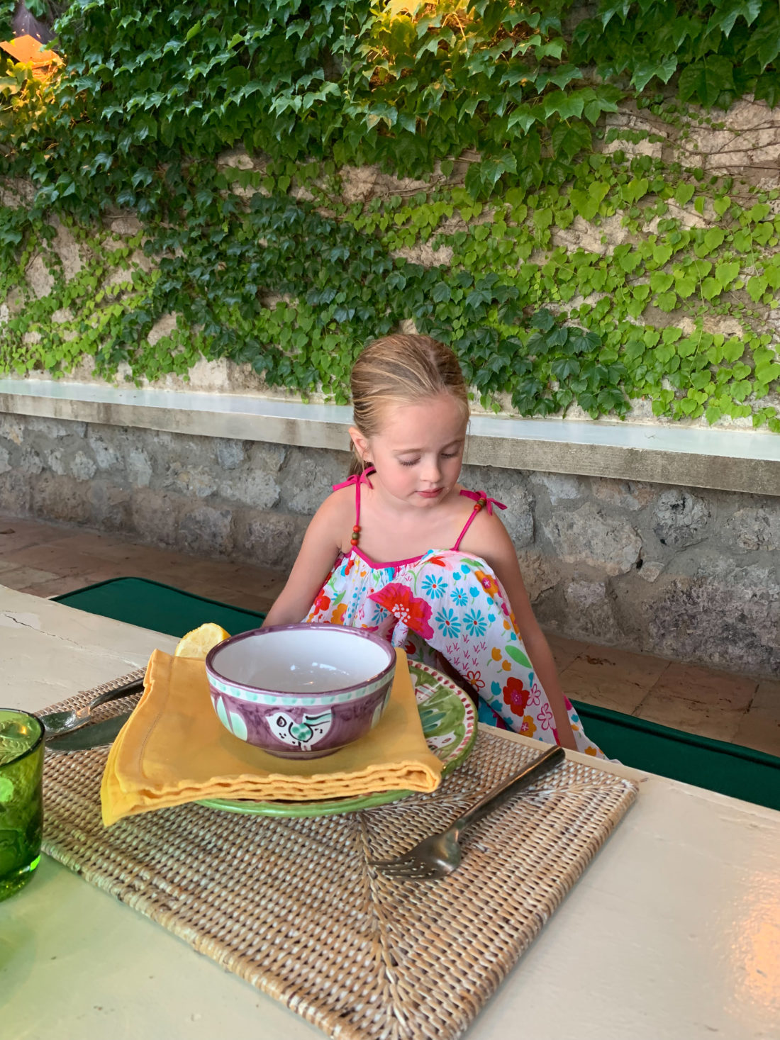 Marlowe Martino enjoying some lunch by the water in Italy