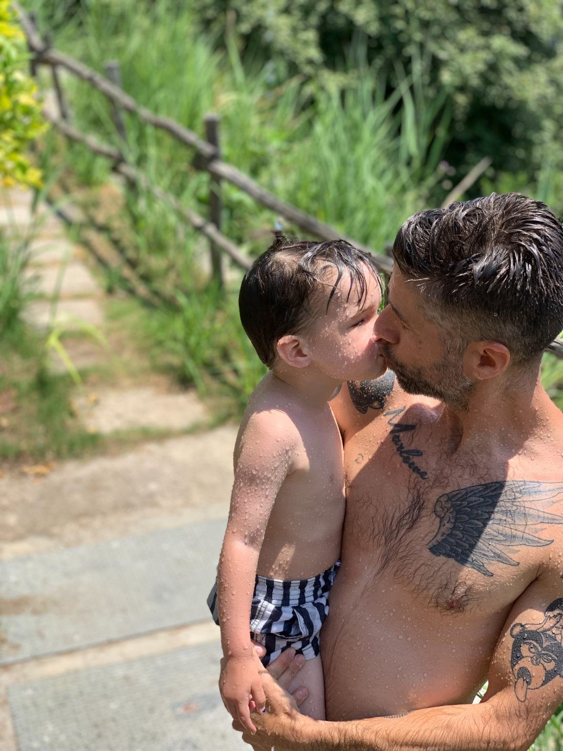 Kyle Martino kissing son Major in Italy