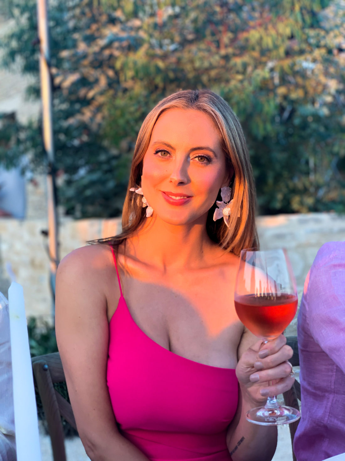 Eva Amurri Martino sips a glass of rosé at a wedding in Croatia