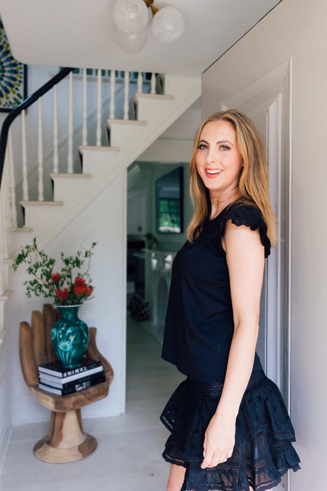 Eva Amurri Martino stands in the doorway of her newly renovated Connecticut home