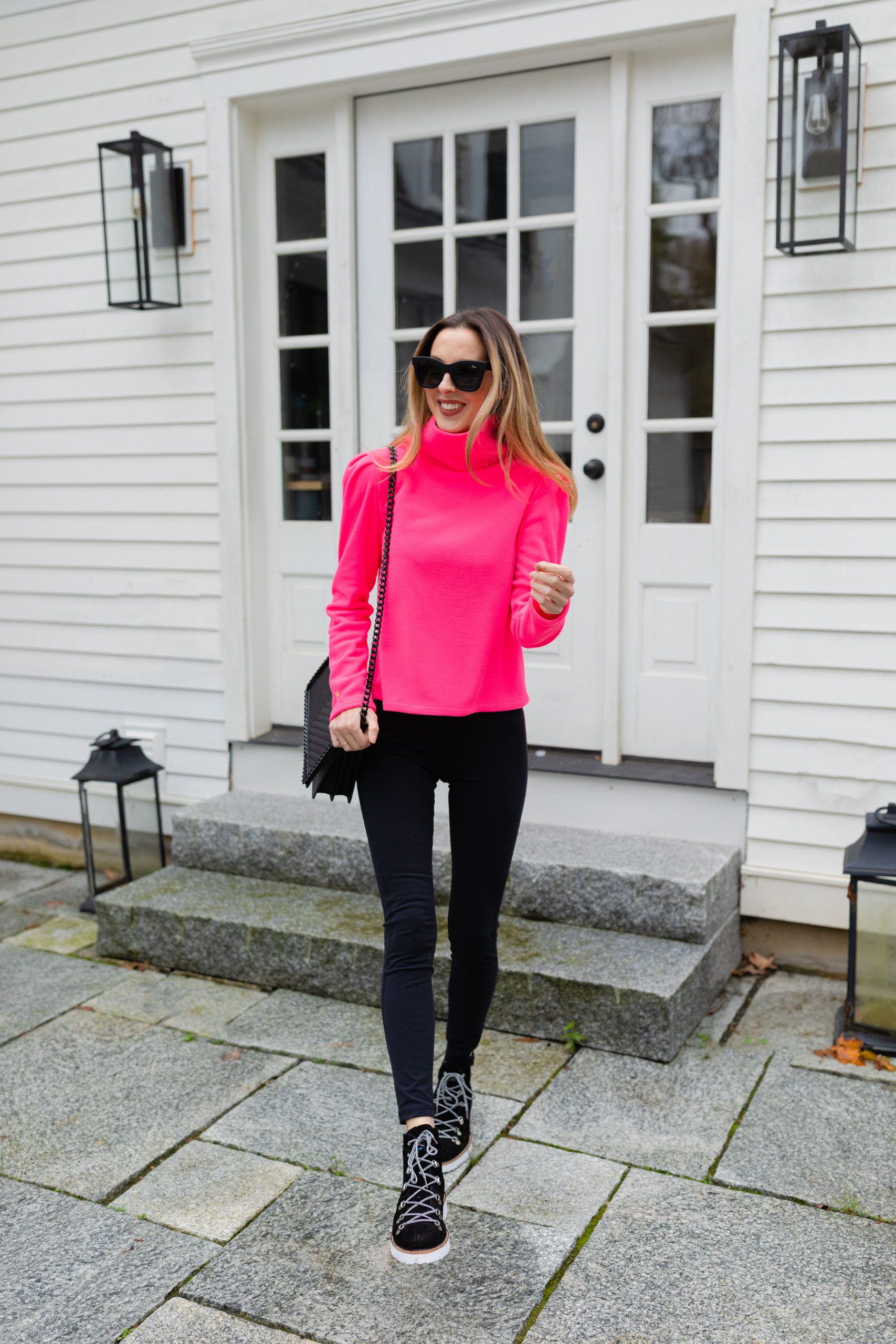 Eva Amurri wears the new Dudley Stephens Palmer Puff Sleeve Fleece in Neon Pink